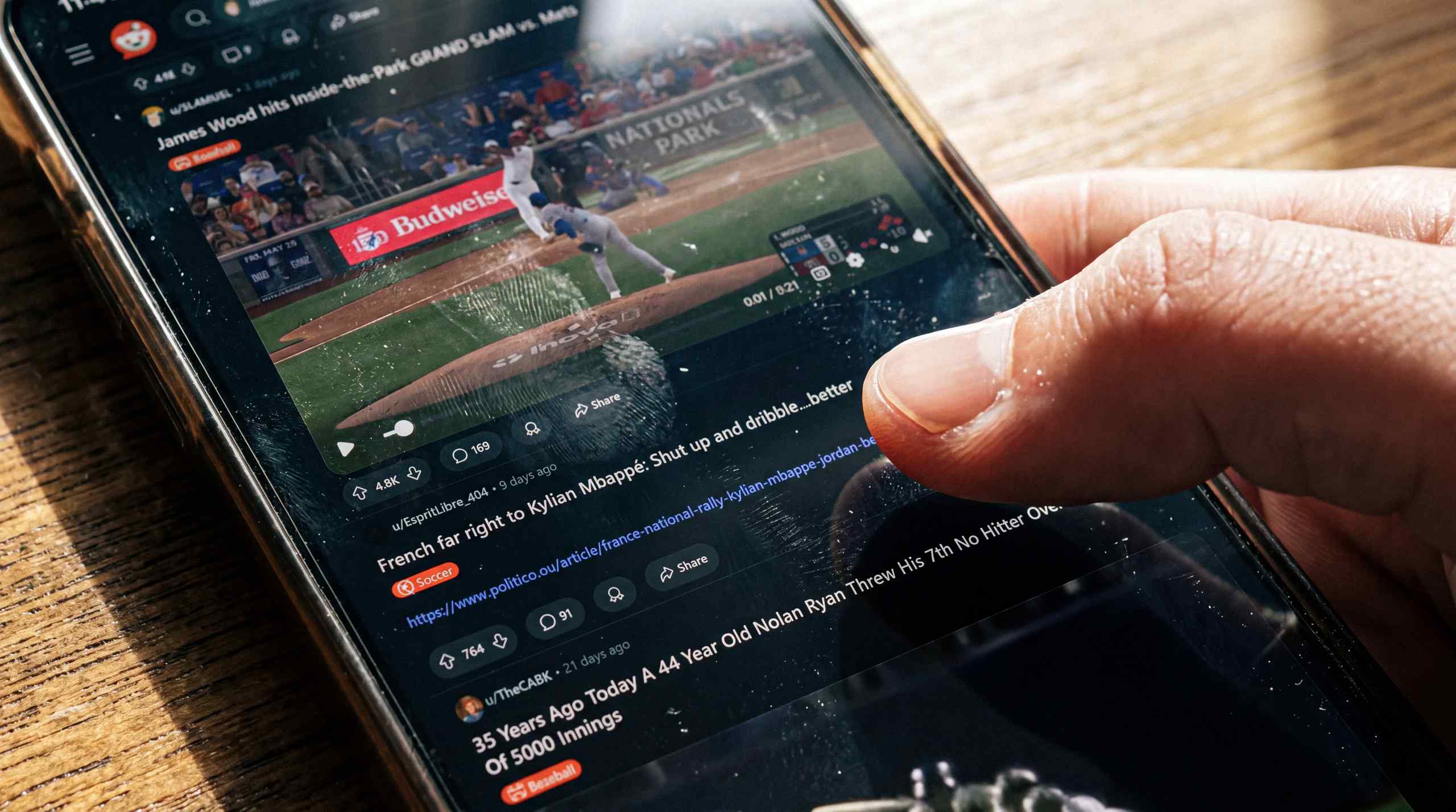 Watching a baseball game on a smartphone